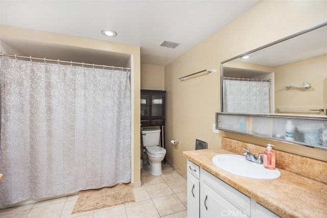 321 Avenida Carmel Unit H, Laguna Woods, CA 92637 - bathroom featuring visible vents, tile patterned floors, vanity, and toilet