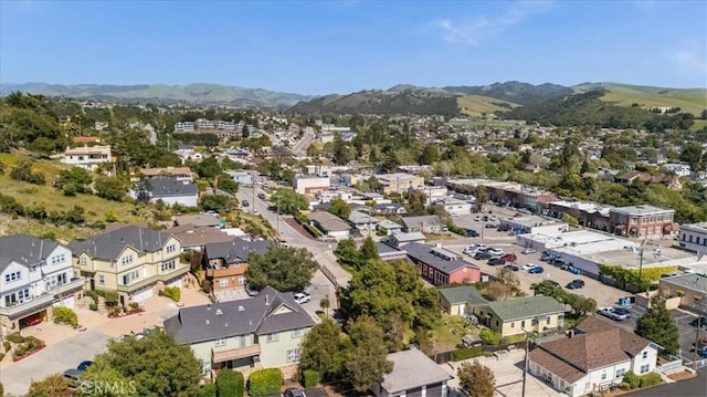 drone / aerial view with a residential view and a mountain view