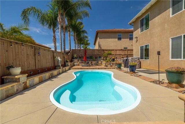 29465 Siderite Cir, Menifee, CA 92584 - view of pool featuring a patio area and a fenced backyard
