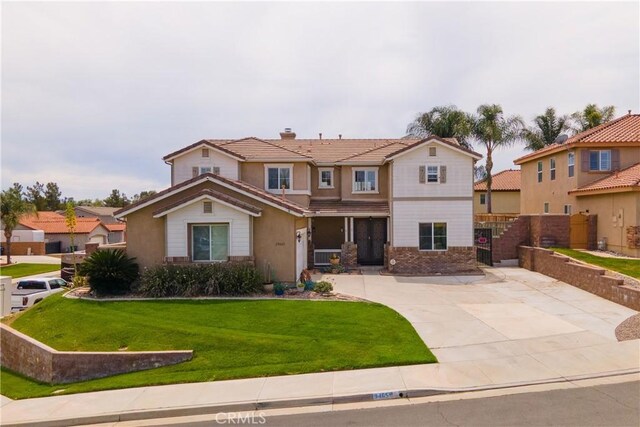 29465 Siderite Cir, Menifee, CA 92584 - view of front of house with a tile roof, concrete driveway, and a chimney