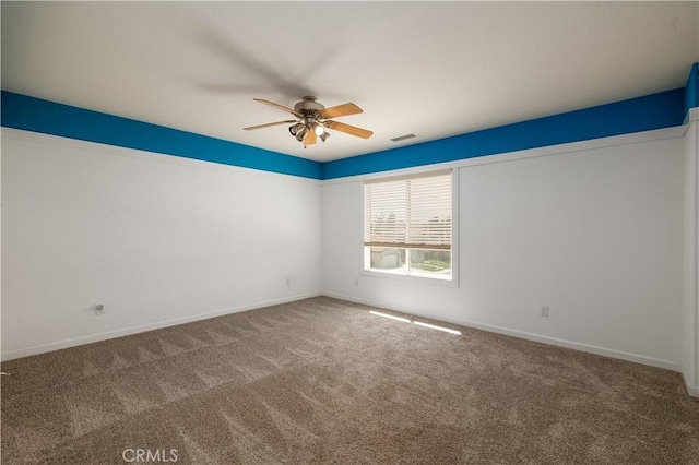 29465 Siderite Cir, Menifee, CA 92584 - spare room featuring ceiling fan, carpet flooring, and baseboards