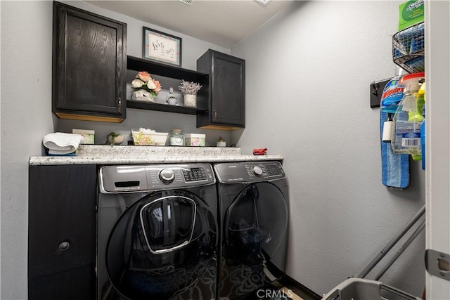 29465 Siderite Cir, Menifee, CA 92584 - laundry area with washing machine and clothes dryer and cabinet space