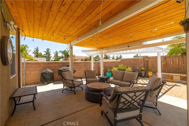 29465 Siderite Cir, Menifee, CA 92584 - fenced backyard with outdoor lounge area, a grill, and a patio