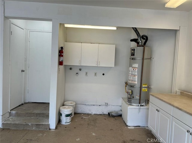 utility room with secured water heater