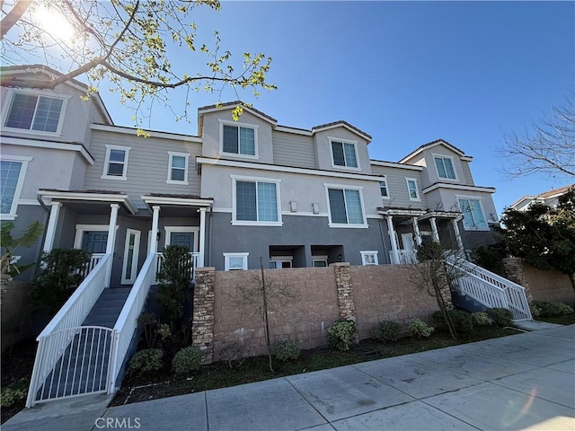 4619 Alekona Ct, Cypress, CA 90630 - view of property with a fenced front yard and stucco siding