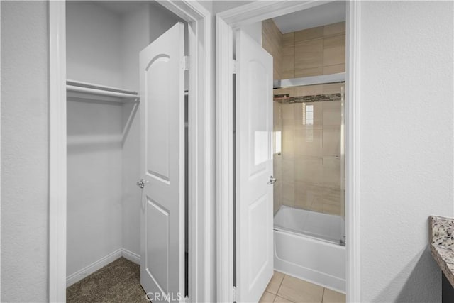 4619 Alekona Ct, Cypress, CA 90630 - full bath featuring shower / bath combination with glass door and tile patterned flooring