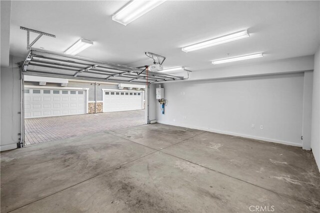 4619 Alekona Ct, Cypress, CA 90630 - garage featuring a garage door opener