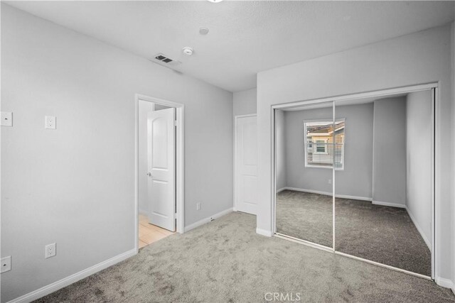 4619 Alekona Ct, Cypress, CA 90630 - unfurnished bedroom with carpet flooring and a closet