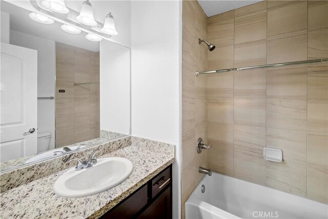 4619 Alekona Ct, Cypress, CA 90630 - bathroom featuring washtub / shower combination and vanity
