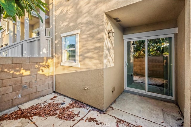 4619 Alekona Ct, Cypress, CA 90630 - doorway to property featuring stucco siding