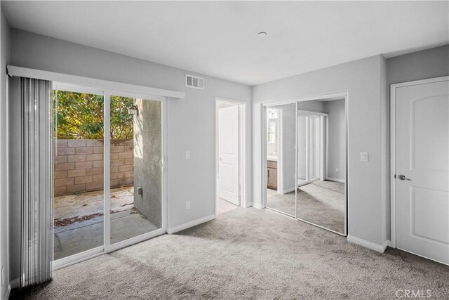 4619 Alekona Ct, Cypress, CA 90630 - unfurnished bedroom with access to outside, carpet flooring, and a closet
