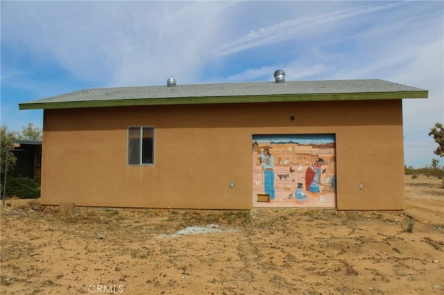 1471 Luna Mesa Rd, Yucca Valley, CA 92284 - rear view of property featuring stucco siding