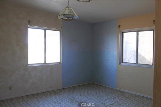 1471 Luna Mesa Rd, Yucca Valley, CA 92284 - empty room with plenty of natural light and baseboards