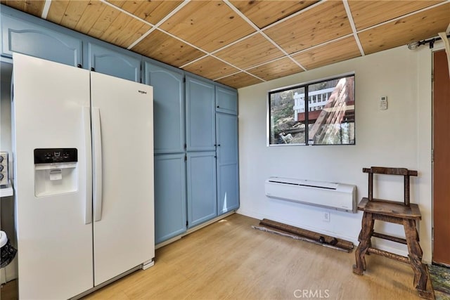 23677 Crest Forest Dr, Crestline, CA 92325 - kitchen with white refrigerator with ice dispenser, blue cabinetry, light wood finished floors, and wooden ceiling