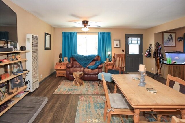631 Vista Ave, Sugarloaf, CA 92386 - living area with dark wood-style flooring, a healthy amount of sunlight, baseboards, and ceiling fan