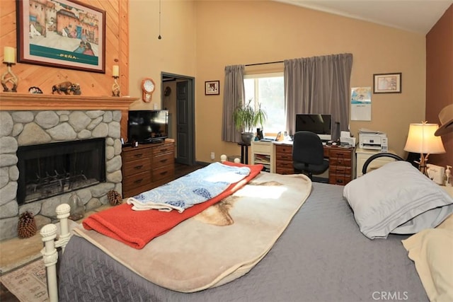 631 Vista Ave, Sugarloaf, CA 92386 - bedroom featuring vaulted ceiling and a stone fireplace