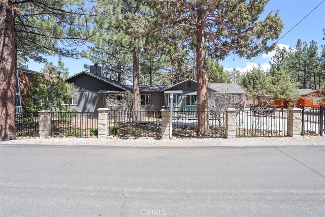 631 Vista Ave, Sugarloaf, CA 92386 - view of front of home with a fenced front yard