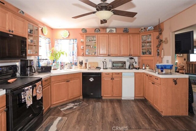 631 Vista Ave, Sugarloaf, CA 92386 - kitchen with black appliances, a peninsula, dark wood-type flooring, and glass insert cabinets