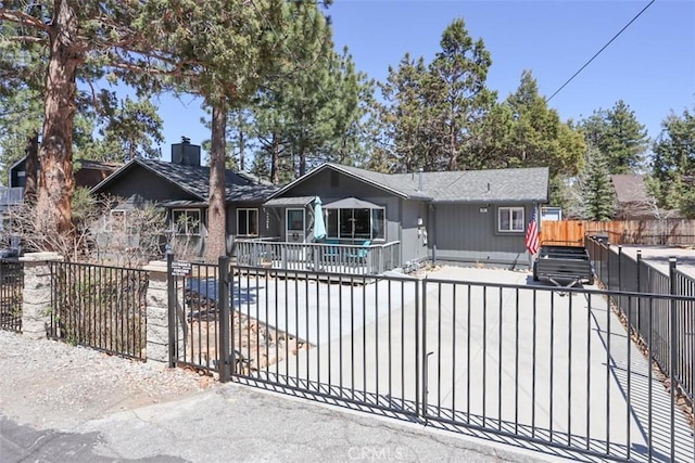 631 Vista Ave, Sugarloaf, CA 92386 - back of property featuring a gate and a fenced front yard