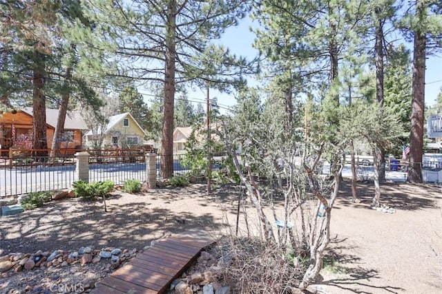 631 Vista Ave, Sugarloaf, CA 92386 - view of yard featuring fence