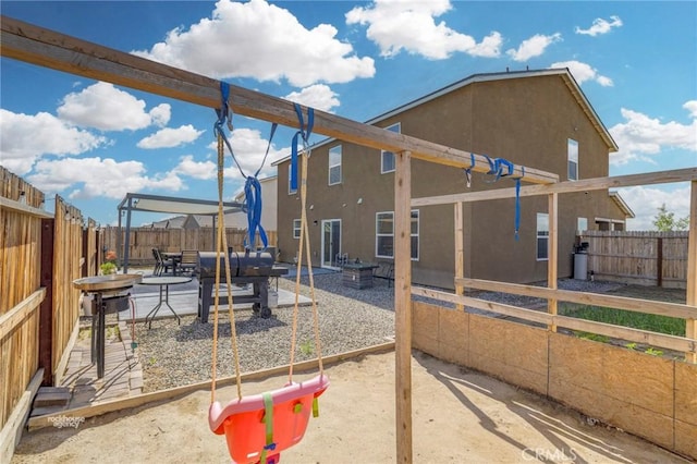 exterior space featuring a patio and a fenced backyard