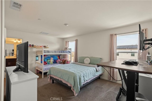 bedroom featuring visible vents and carpet flooring
