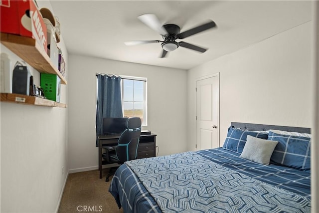 carpeted bedroom featuring baseboards and ceiling fan