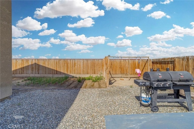 view of yard with a fenced backyard