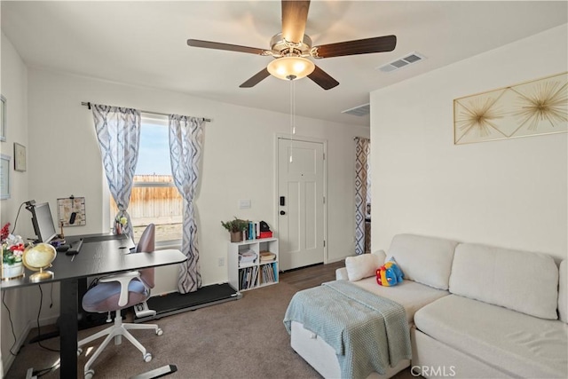living room featuring visible vents, ceiling fan, and carpet floors