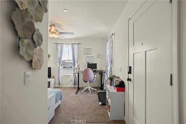 carpeted bedroom with baseboards