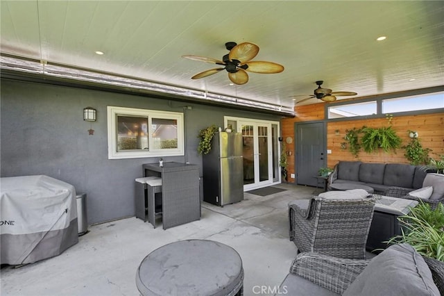 3251 Woodstock Rd, Rossmoor, CA 90720 - view of patio featuring a ceiling fan and an outdoor hangout area