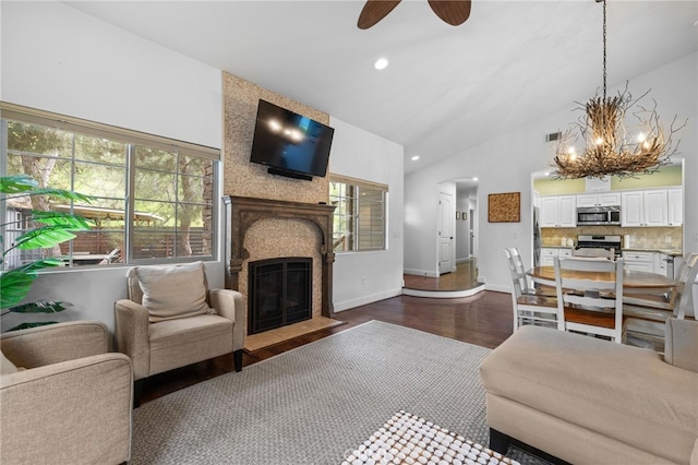 1753 Filbert St, Paso Robles, CA 93446 - living area with ceiling fan with notable chandelier, a large fireplace, baseboards, dark wood-type flooring, and recessed lighting