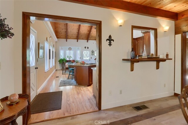 36575 Mudge Ranch Rd, Coarsegold, CA 93614 - hallway with light wood-style flooring, wood ceiling, visible vents, and beam ceiling