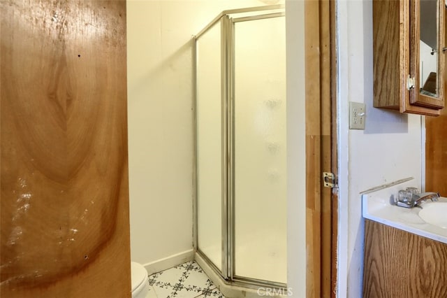 36575 Mudge Ranch Rd, Coarsegold, CA 93614 - full bath with toilet, a stall shower, vanity, and baseboards