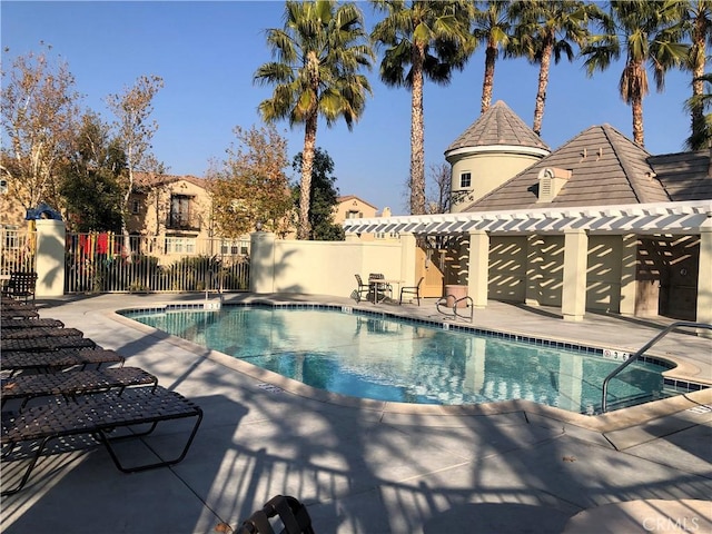 1800 E Lakeshore Dr Unit 302, Lake Elsinore, CA 92530 - community pool with fence and a patio