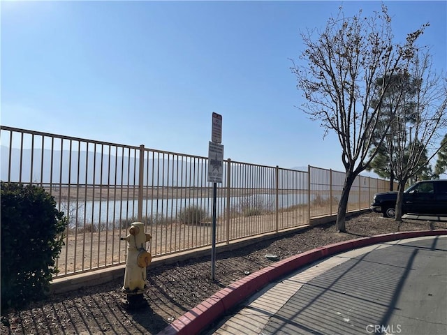 1800 E Lakeshore Dr Unit 302, Lake Elsinore, CA 92530 - view of patio / terrace with fence