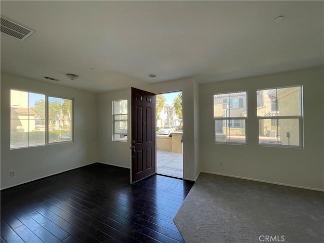 1800 E Lakeshore Dr Unit 302, Lake Elsinore, CA 92530 - interior space with dark wood-style flooring, baseboards, and visible vents