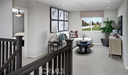8800 Newcastle St, Hesperia, CA 92345 - living area featuring recessed lighting, carpet flooring, baseboards, and ceiling fan