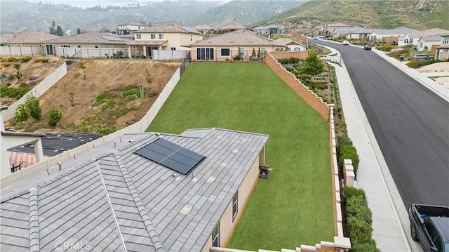 aerial view of residential area with a mountain backdrop
