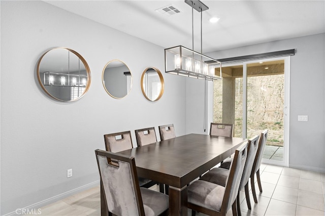 21123 Mill Valley Ct, Riverside, CA 92507 - dining space featuring light tile patterned flooring and a chandelier