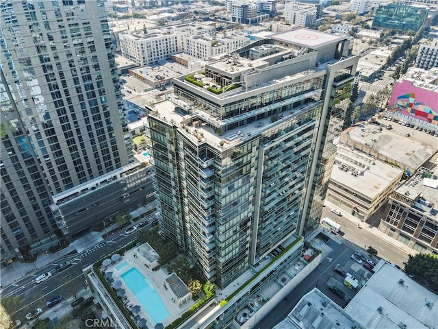 birds eye view of property with a city view