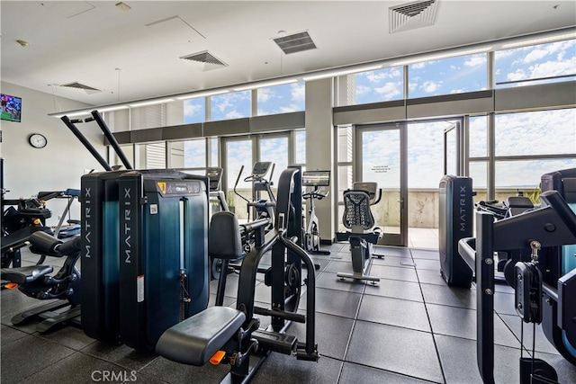 exercise room featuring visible vents