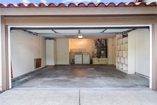 28133 Espinoza, Mission Viejo, CA 92692 - garage featuring water heater, washer and clothes dryer, and a garage door opener