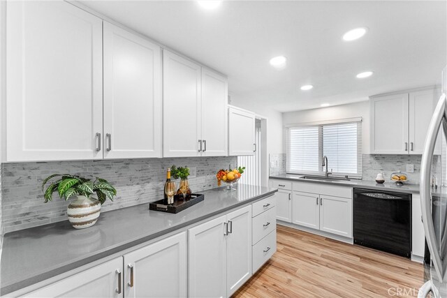 28133 Espinoza, Mission Viejo, CA 92692 - kitchen featuring white cabinets, tasteful backsplash, dishwasher, and a sink