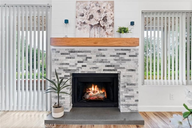 28133 Espinoza, Mission Viejo, CA 92692 - details featuring a stone fireplace, wood finished floors, and baseboards