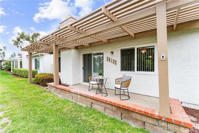 28133 Espinoza, Mission Viejo, CA 92692 - rear view of property with a pergola, a chimney, a yard, and stucco siding