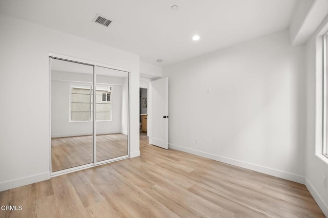 2391 Yorkshire Dr, Los Angeles, CA 90065 - unfurnished bedroom with visible vents, baseboards, a closet, light wood-type flooring, and recessed lighting