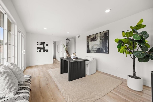 2391 Yorkshire Dr, Los Angeles, CA 90065 - office area featuring visible vents, baseboards, light wood finished floors, and a healthy amount of sunlight
