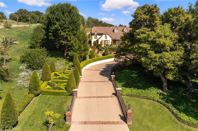surrounding community with a lawn