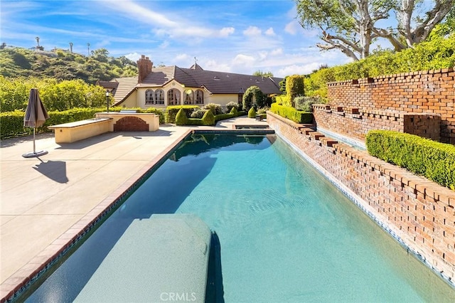 pool with a patio